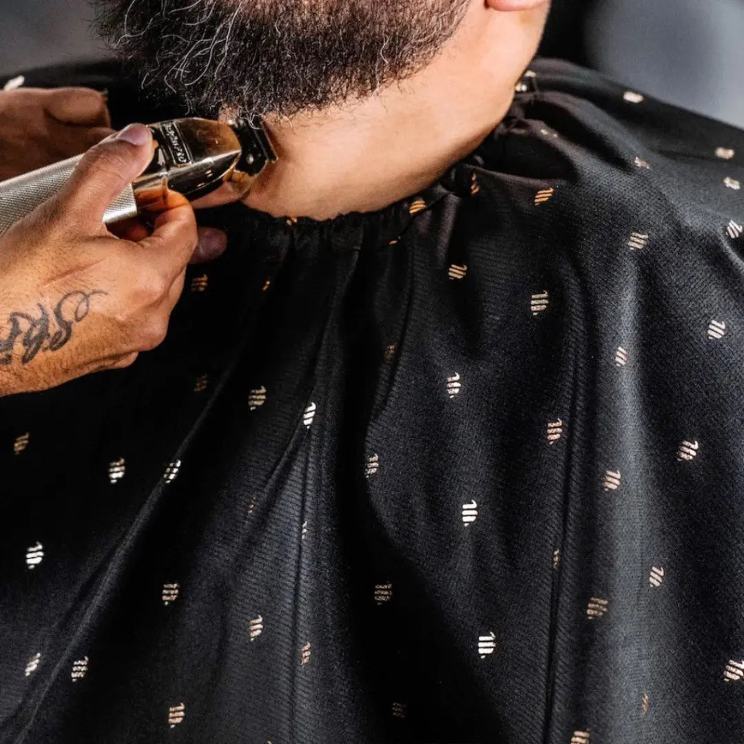 Barber Strong™ Shield Barber Cutting Cape – Professional Static-Free, Water & Hair-Resistant NanoShield Cape (Black with White Trim)